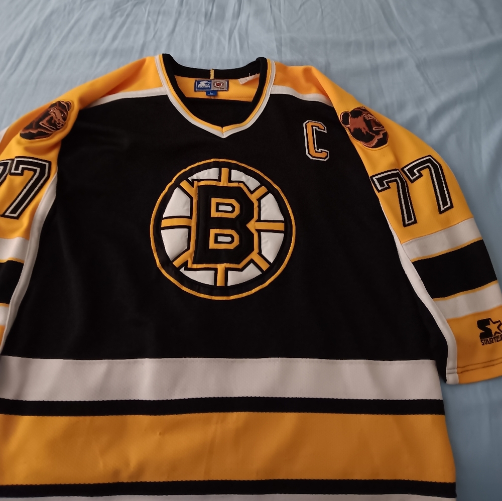 Bruins starter sweater, capt Ray Bourque #77 size large black and gold.